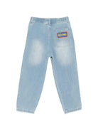 Jeans per bambino Moschino Kids azzurri con decorazioni in rilievo HUP08XL0E37 41100 MOSCHINO KIDS 