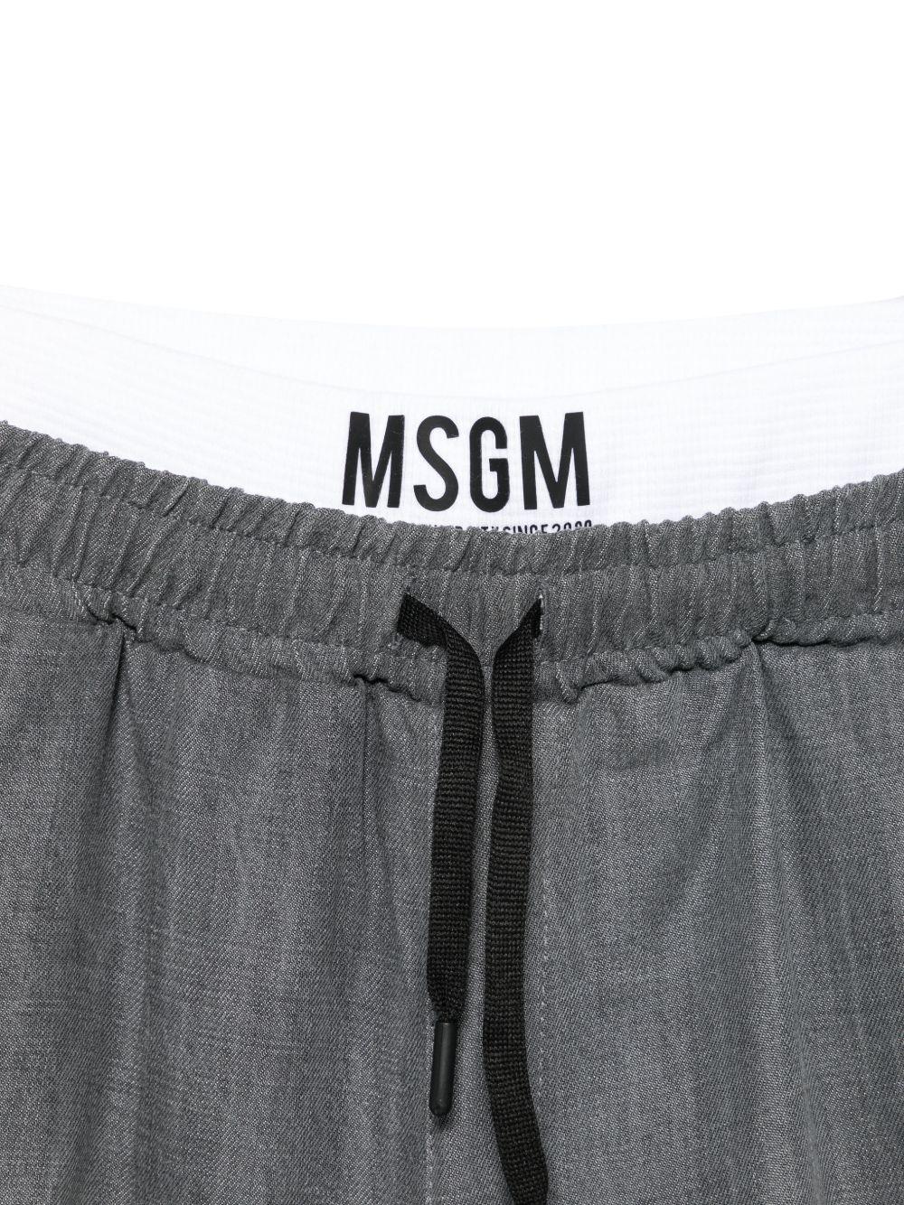 Pantaloni per bambino MSGM Kids grigi con elastico in vita S6MSJUPA038 102 MSGM KIDS 