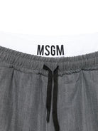 Pantaloni per bambino MSGM Kids grigi con elastico in vita S6MSJUPA038 102 MSGM KIDS 