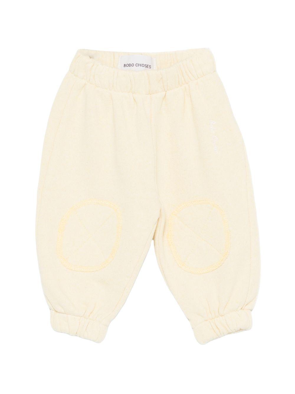 Shorts per neonato Bobo Choses beige con toppe gialle B126AB067 721 BOBO CHOSES KIDS 