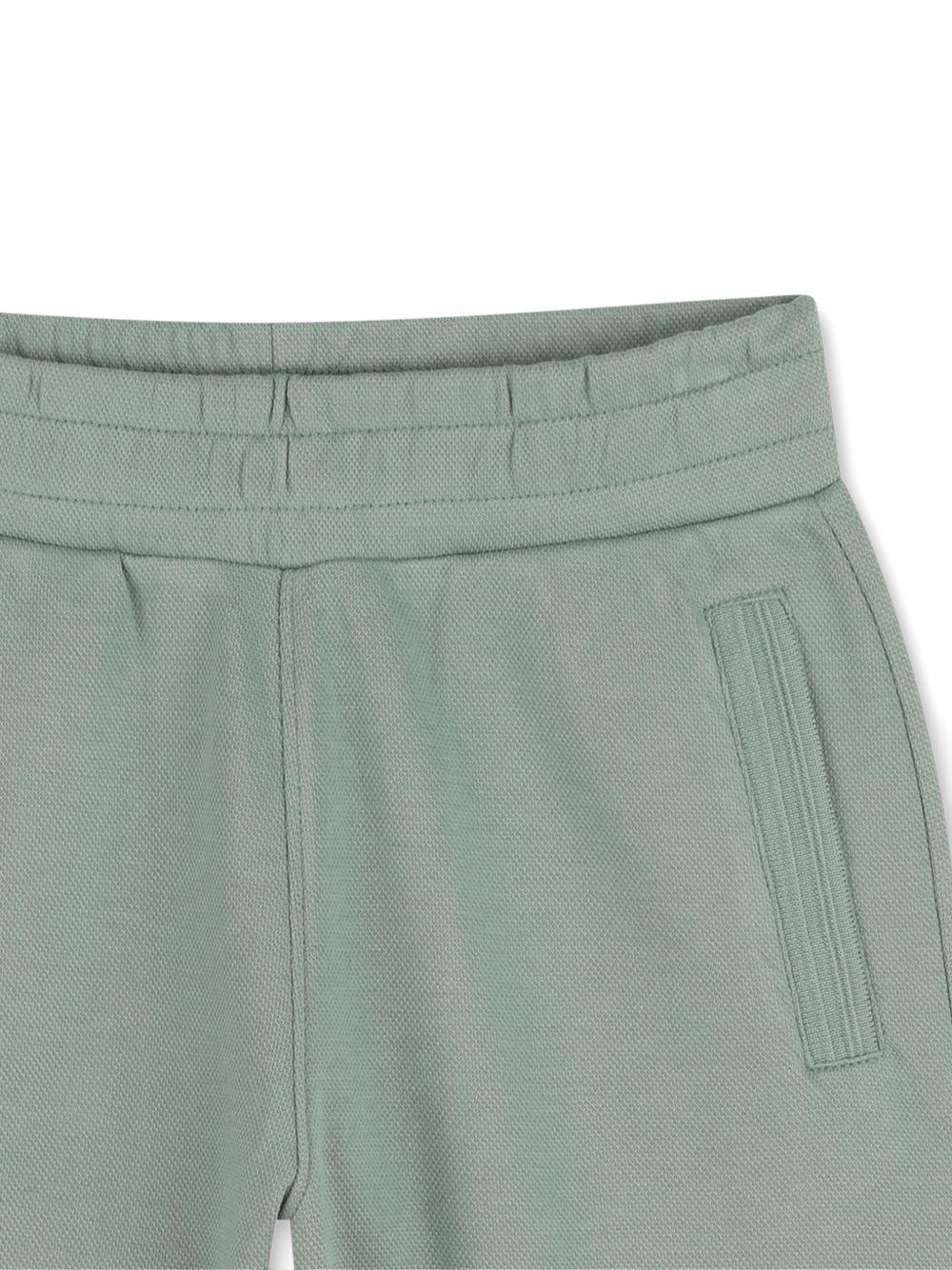 Shorts per bambino Boss Kids verde con logo sula davanti J52930 64U BOSS KIDS 