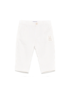 Pantaloni a righe per neonata Moschino Kids beige con passanti MUP05ELYE01 84313 MOSCHINO KIDS 