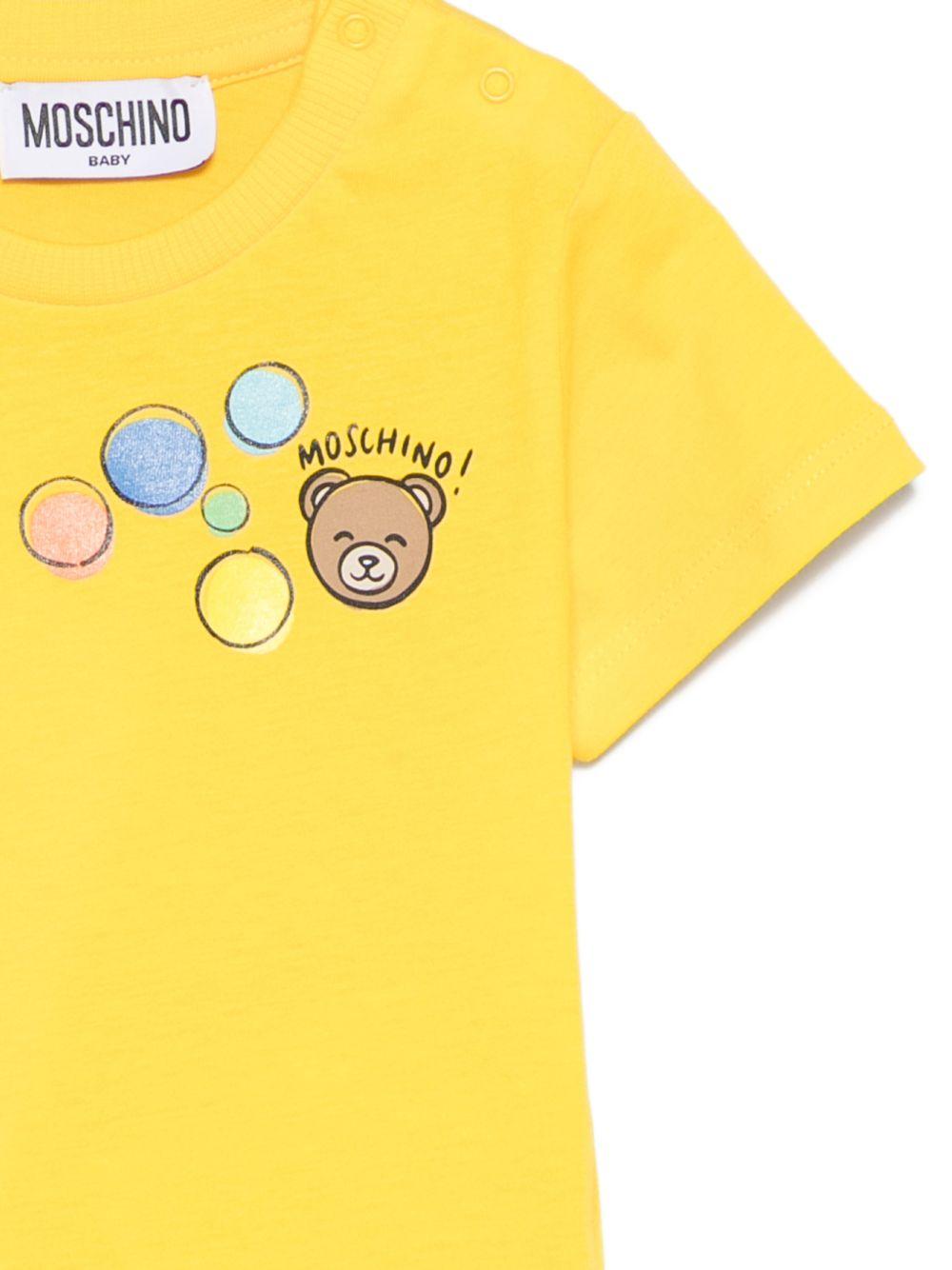 T-shirt per neonati Moschino Kids gialla con stampa grafica M5M047LAA03 50577 MOSCHINO KIDS 