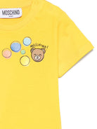 T-shirt per neonati Moschino Kids gialla con stampa grafica M5M047LAA03 50577 MOSCHINO KIDS 