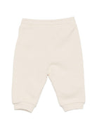 Pantaloni sportivi per neonato Versace Kids beige con dettaglio logo 10251531A18127 2YE00 VERSACE KIDS 