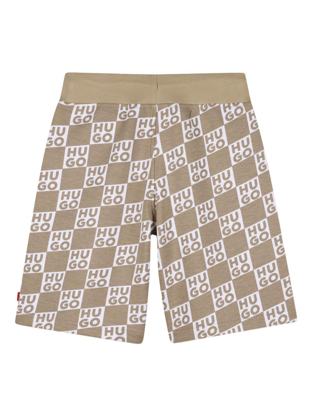 Shorts per bambino Hugo Kids beige con stampa logo all-over G00999 23B Hugo KIDS 