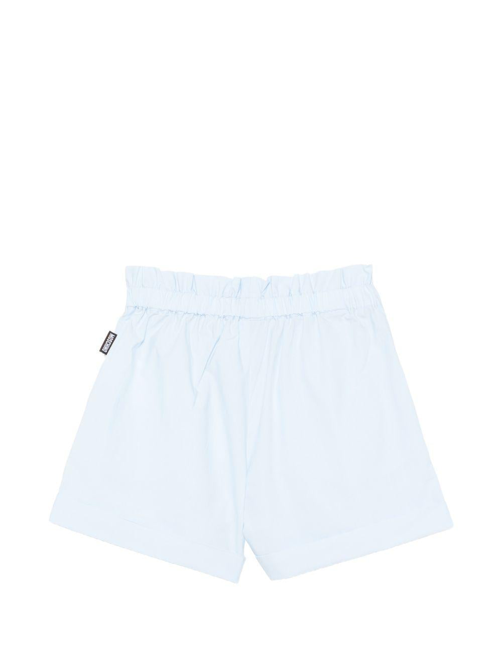 Shorts per bambina Moschino Kids azzurro con vita elasticizzata HDQ01YLLA10 40543 MOSCHINO KIDS 