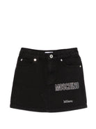 Gonna per bambina Moschino Kids nera con logo sul davanti HBJ03MLSC00 60100 MOSCHINO KIDS 