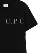 T-shirt per bambino C.P. Company Kids nera con logo sul davanti C5M00LLAA17 60100 C.P.COMPANY KIDS 