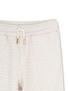 Pantaloni per bambino Michael Kors Kids bianchi con motivo all-over R30571 190 MICHAEL KORS KIDS 