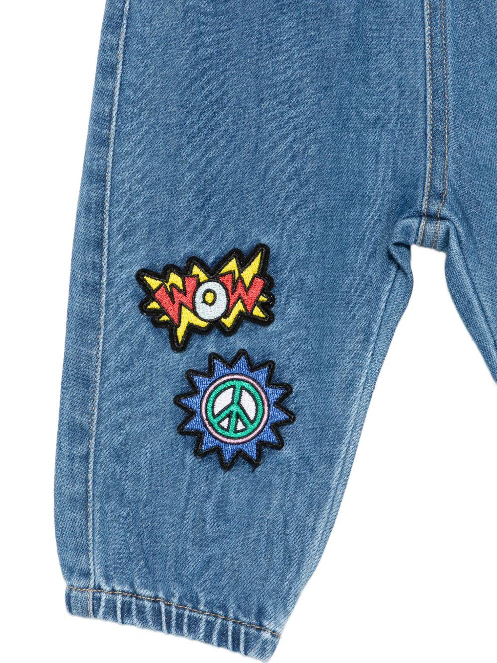 Pantaloni per neonato Moschino Kids denim con toppe ricamate MUP05SL0E34 40646 MOSCHINO KIDS 