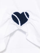 T-shirt con applicazione a cuore per bambina Monnalisa bianco con orlo asimettrico 11E611 5202 9956 MONNALISA 