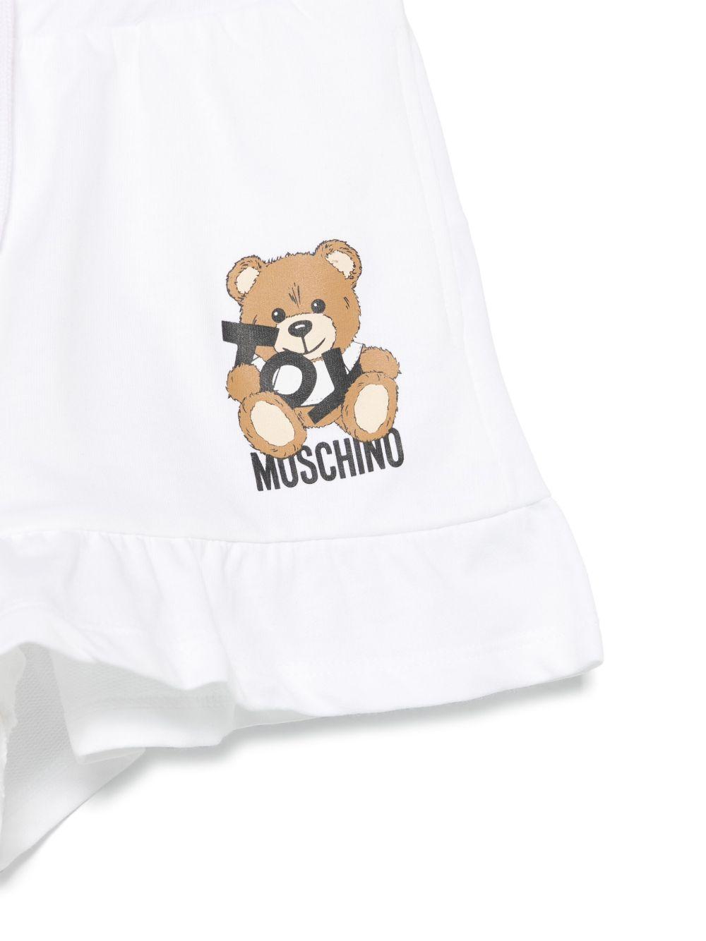 Shorts con stampa Leo Teddy per bambina Moschino Kids bianco con due tasche laterali HAQ014LCA19 10101 MOSCHINO KIDS 