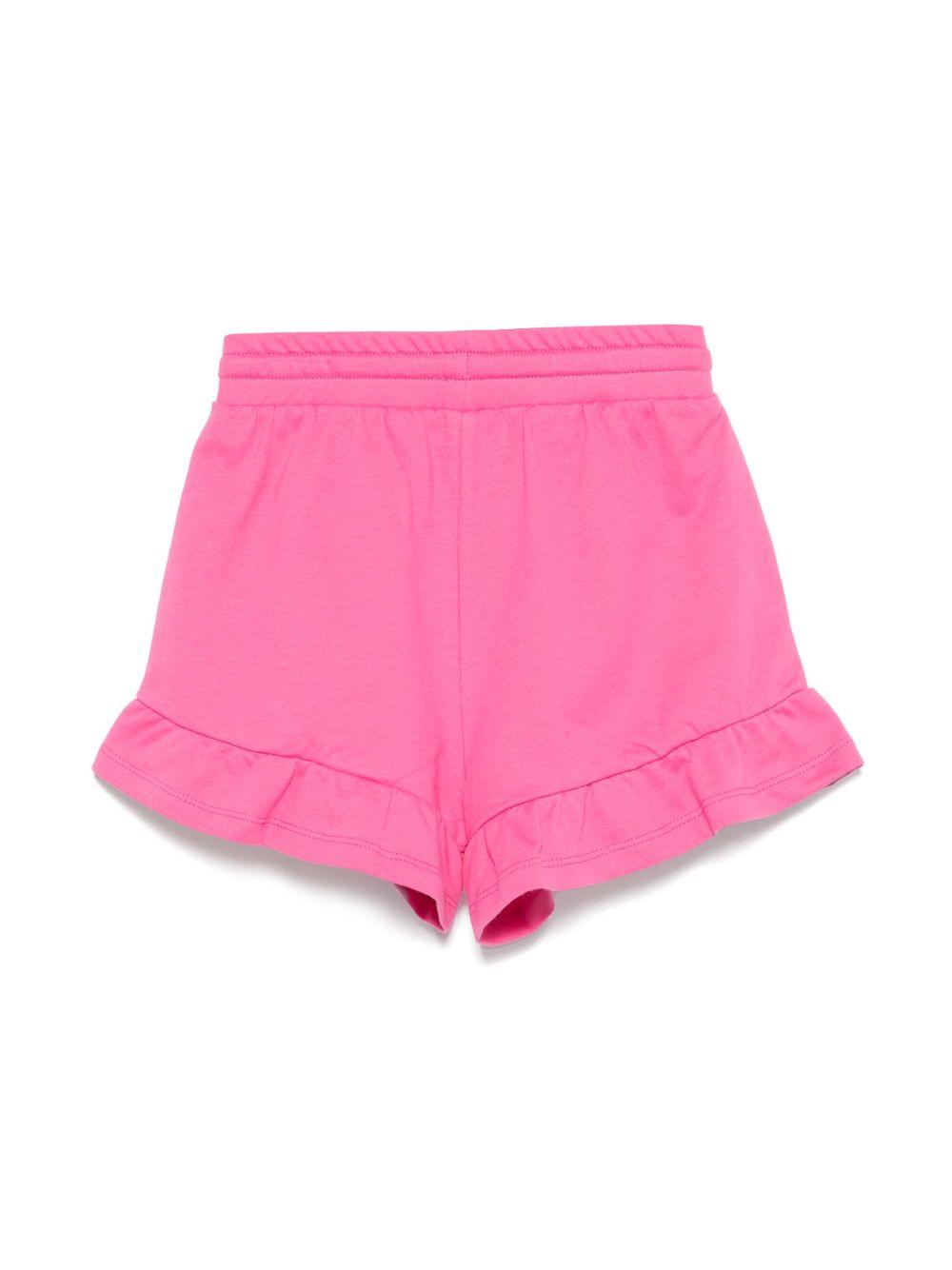 Shorts con stampa Leo Teddy per bambina Moschino Kids fucsia con due tasche laterali HAQ014LCA19 50533 MOSCHINO KIDS 