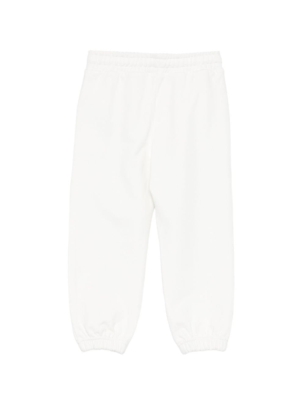 Pantaloni sportivi per bambino Moschino Kids bianchi con logo sul davanti HMP07CLCA32 10063 MOSCHINO KIDS 