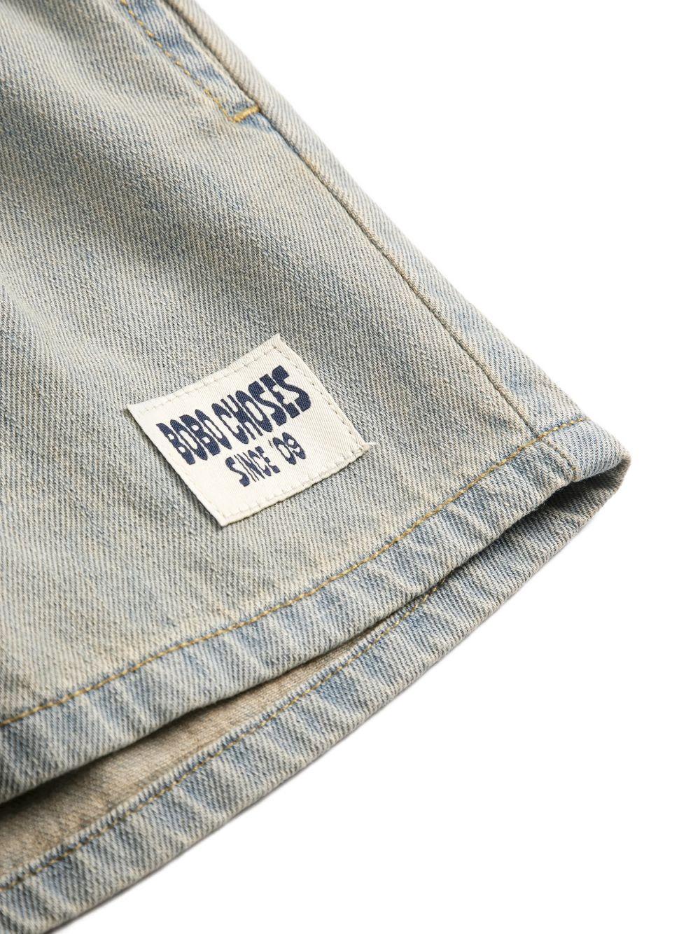 Shorts per bambino Bobo Choses denim con dettaglio logo B126AC073 461 BOBO CHOSES KIDS 