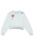 Maglione per bambina Simonetta azzurro con applicazioni floreali SY9A20 X0018 700 SIMONETTA KIDS 