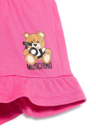 Shorts con stampa Leo Teddy per bambina Moschino Kids fucsia con due tasche laterali HAQ014LCA19 50533 MOSCHINO KIDS 