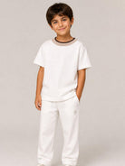 T-shirt per bambino Eleventy Kids bianca con girocollo a contrasto EZ8H11 Z3708 101 ELEVENTY KIDS 