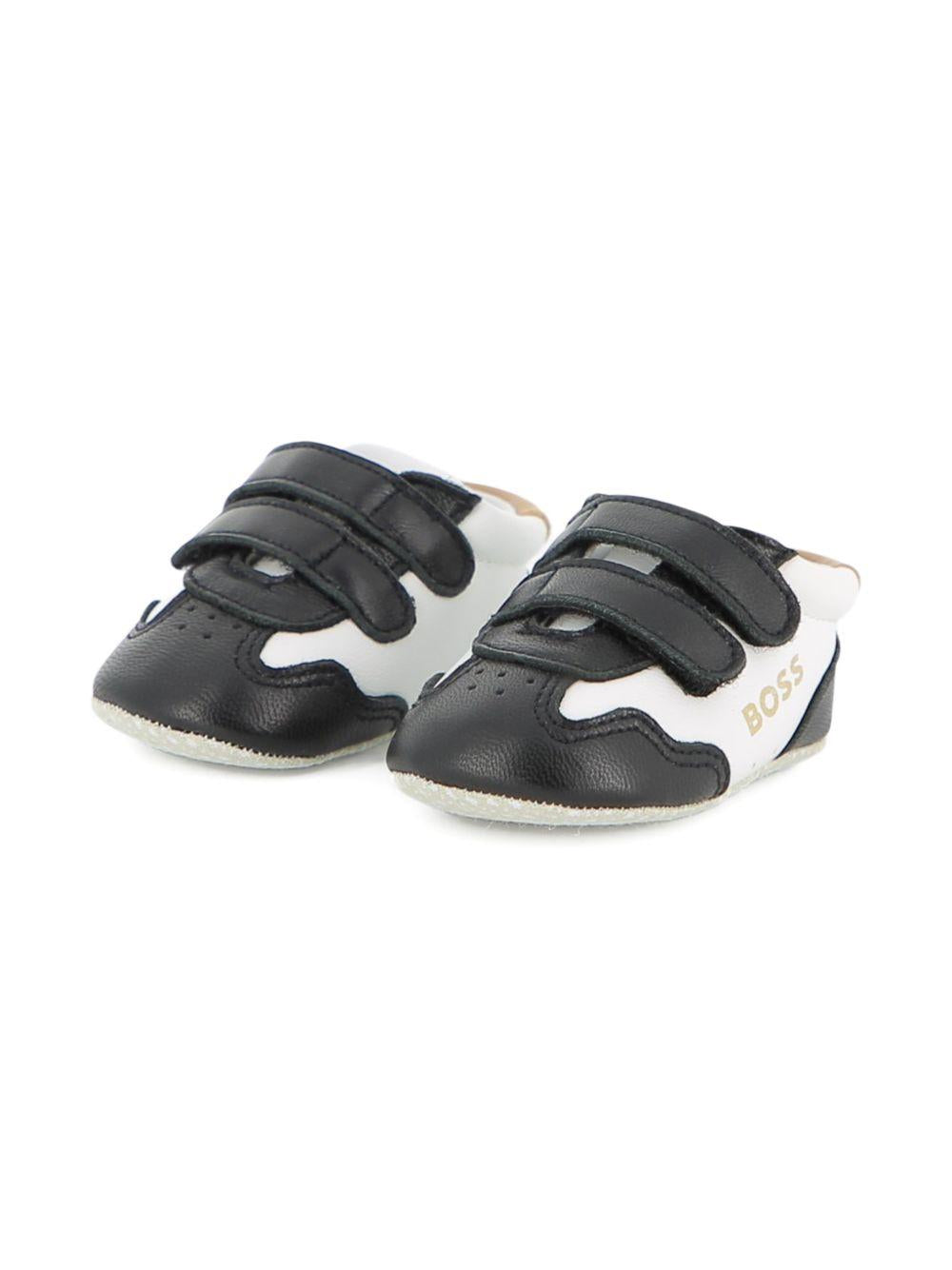 Scarpine primi passi per neonato Boss Kids bianche e nere con design a inserti J53243 09B BOSS KIDS 