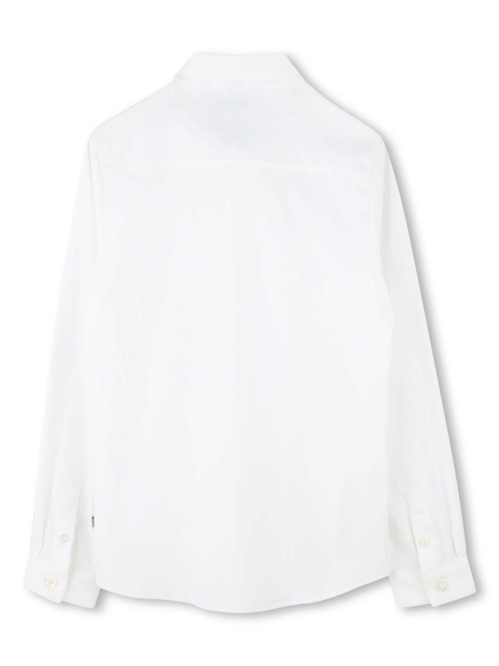 Camicia a maniche lunghe per bambino BOSS Kidswear bianco con orlo curvo J52010 10P BOSS KIDS 