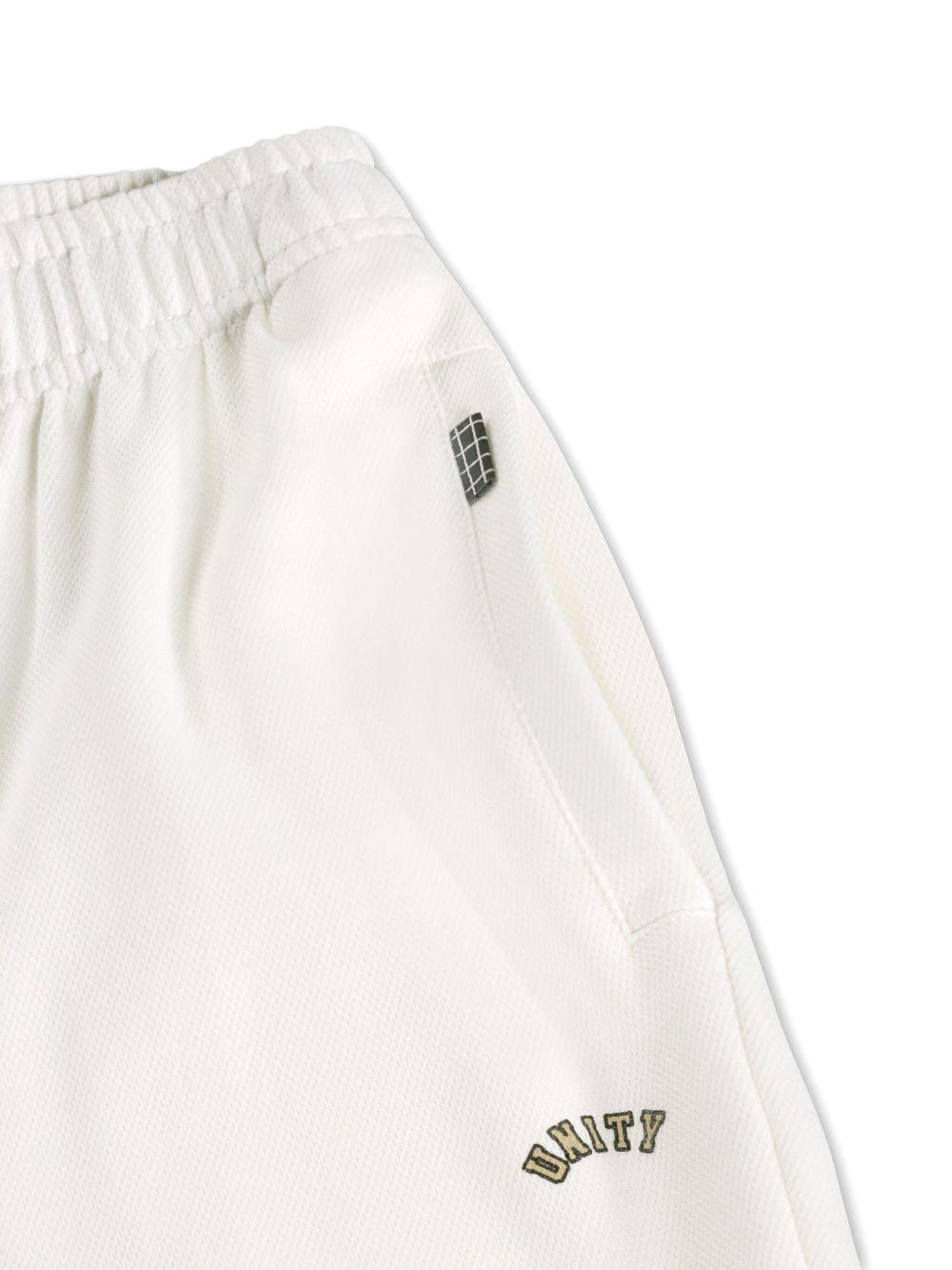 Shorts Adeen per bambino Molo bianchi con bordo a contrasto 1S26H210 5632 MOLO KIDS 