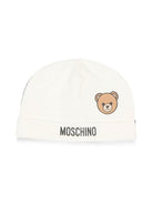 Berretto per neonati Moschino Kids bianco con dettaglio Teddy Bear MUX066LCA40 10063 MOSCHINO KIDS 