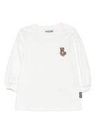 Abito per neonata Moschino Kids bianco con maniche a sbuffo MAV0BNLCA40 10063 MOSCHINO KIDS 