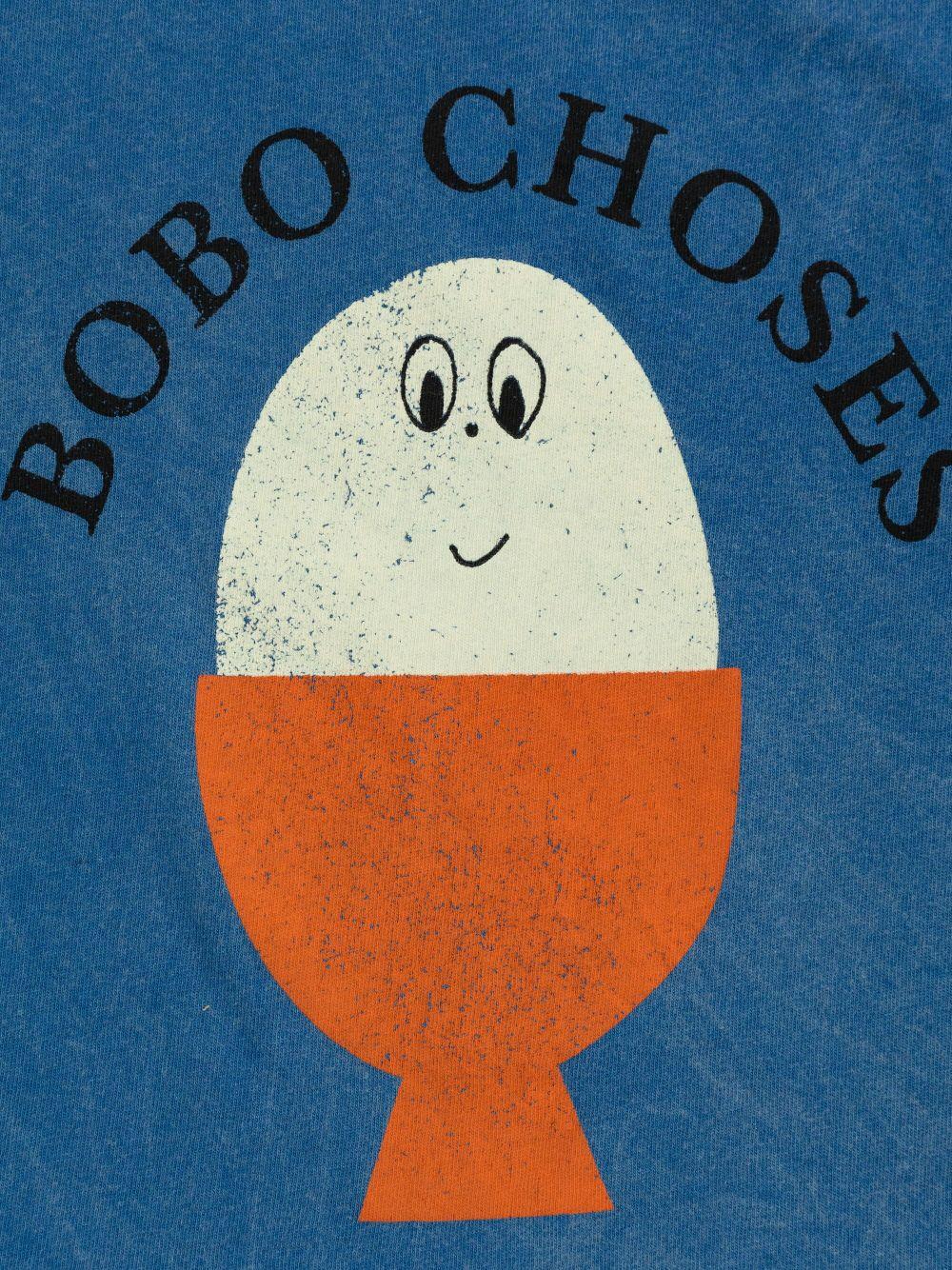 T-shirt per neonato Bobo Choses Morning Egg blu con stampa sul petto B125AB011 421 BOBO CHOSES KIDS 