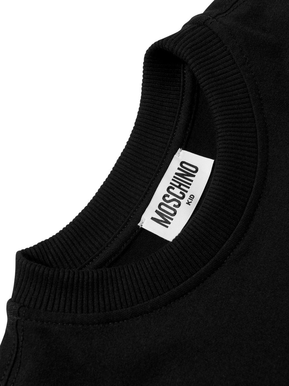 T-shirt per bambino Moschino Kids nera con taschino sul petto HUM05MLAA01 60100 MOSCHINO KIDS 