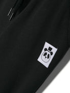 Pantaloni sportivi con applicazione logo per neonato Mini Rodini nero con calzini a coste 1000014699NB BLACK MINI RODINI 