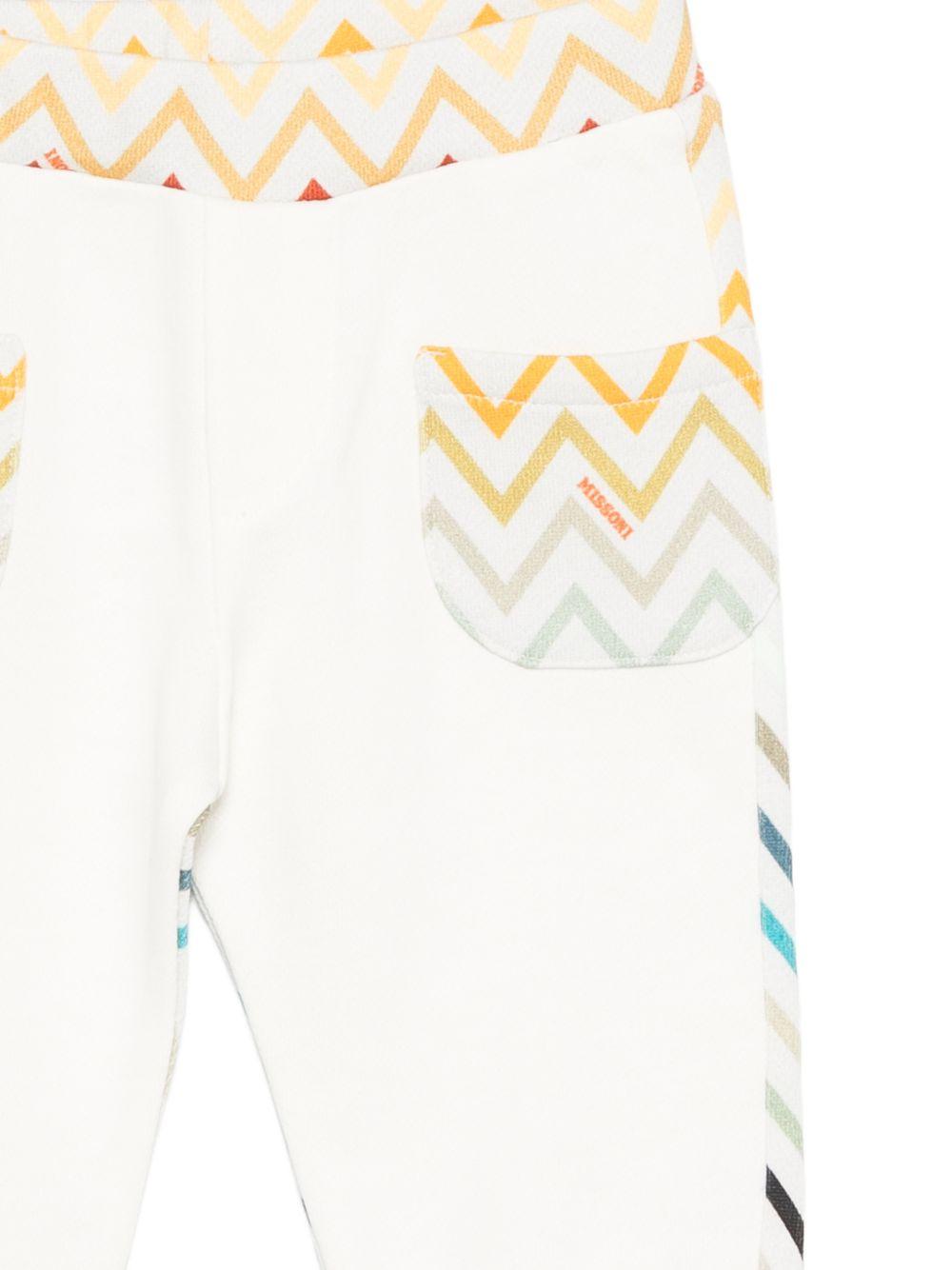 Pantaloni sportivi per neonato Missoni Kids bianchi con motivo a zigzag MZ6300 Z3183 102MC MISSONI KIDS 