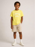 T-shirt per bambini Givenchy Kids gialla con stampa logo sul davanti H31345 508 GIVENCHY KIDS 