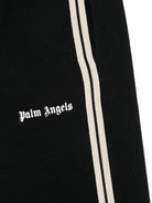 Pantalone per bambino Palm Angels Kids nero con dettaglio logo PBCH012S26FLE001 110 PALM ANGELS KIDS 