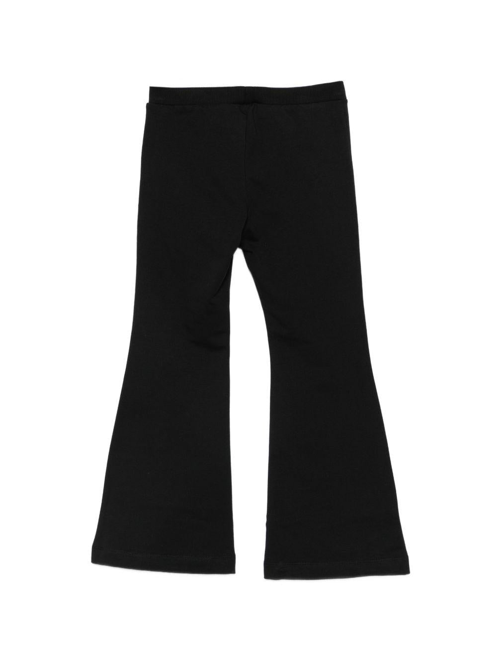Pantaloni per bambina Moschino Kids neri con stampa Teddy Bear HEP050LDA63 60100 MOSCHINO KIDS 