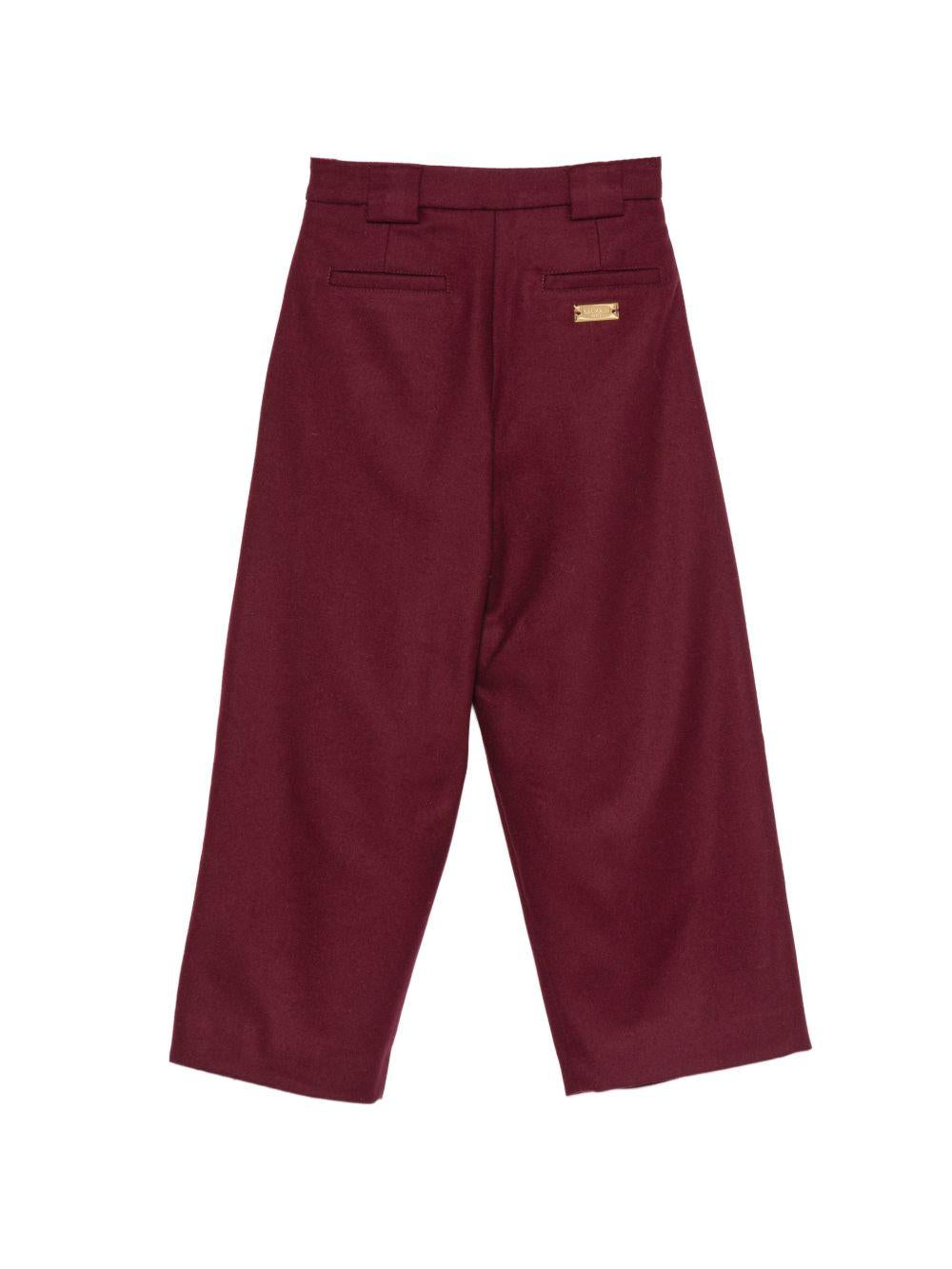 Pantaloni per bambino Balmain Kids rossi con placca con logo color oro BZ6A40 I0339 530OR BALMAIN KIDS 