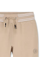 Pantaloni sportivi da bambino Boss Kids beige con stampa logo J52909 249 BOSS KIDS 