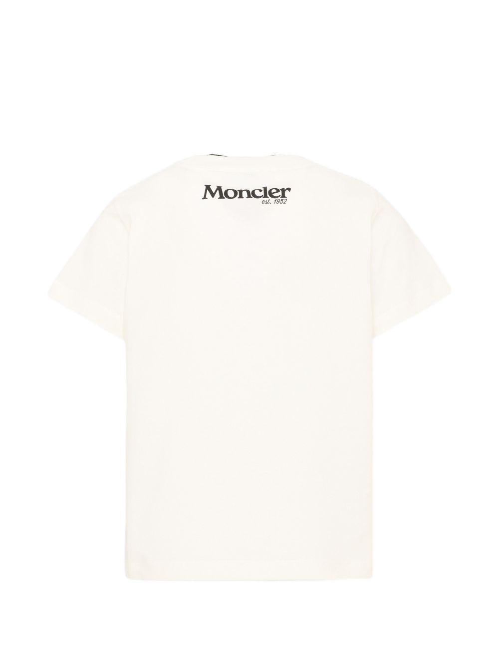 T-shirt per bambino Moncler Enfant bianca con dettaglio logo L29548C0000889AFV 034 MONCLER KIDS 
