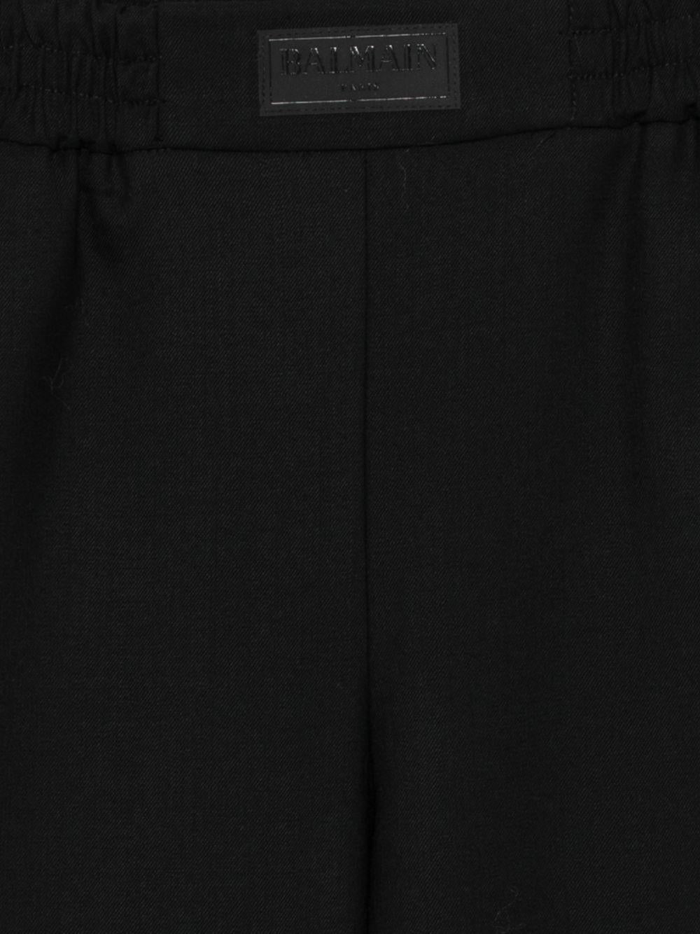 Pantaloni per bambino Balmain Kids neri con toppa con logo in vita BY6P80 I0196 930 BALMAIN KIDS 