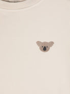T-shirt per neonata Donsje Jarne beige con ricamo sul petto 4081802 00133 DONSJE KIDS 