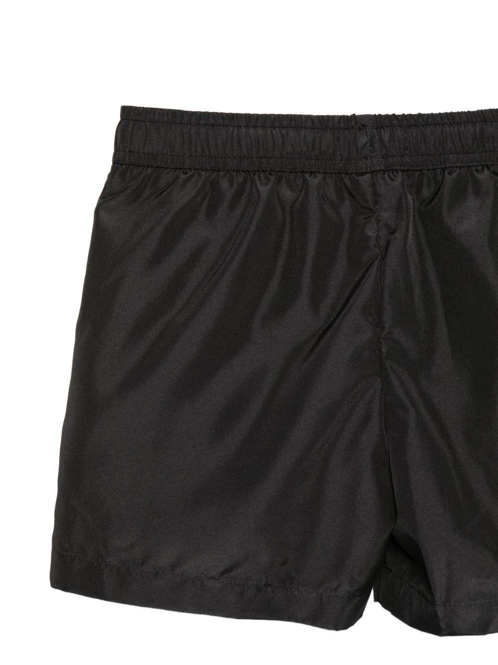 Costume per bambino Moschino Kids nero con logo sul davanti HUL01LLKA02 60100 MOSCHINO KIDS 