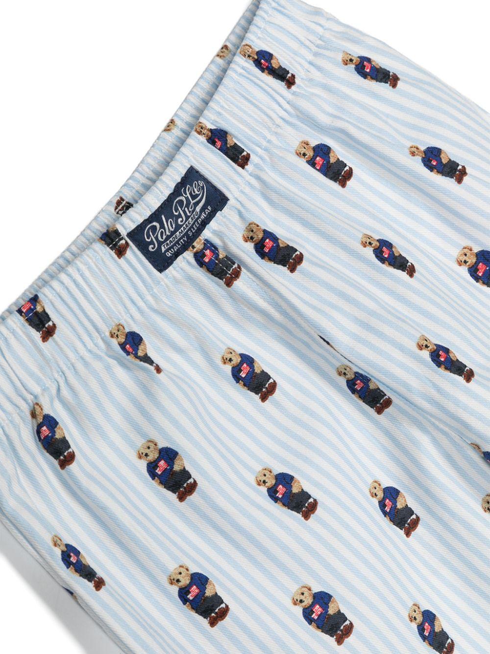 Pigiama per bambino Polo Ralph Lauren Kids azzurro con stampa Polo Bear P0139 W2O Ralph Lauren kids 