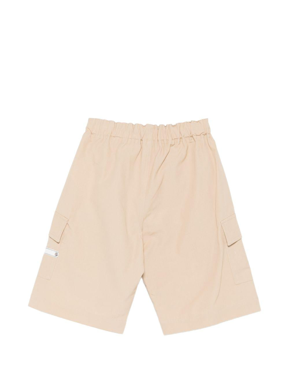 Shorts cargo per bambino Moschino Kids beige con dettaglio logo HUQ02ILLA14 20829 MOSCHINO KIDS 