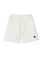 Shorts per bambina Kenzo Kids bianco con applicazione logo sulla gamba K60995 117 KENZO KIDS 