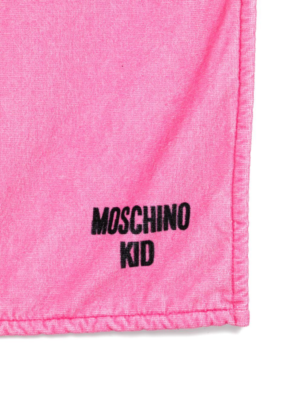 Telo mare per bambina Moschino Kids fucsia con logo sul davanti HTX01BLGA24 50533 MOSCHINO KIDS 
