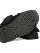 Slippers per bambina UGG Kids Disquette nero con finitura in pelliccia sintetica 1122550 BLK UGG 