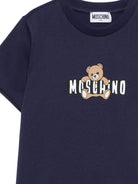 T-shirt per bambini Moschino Kids blu con stampa grafica HZM058LAA03 40016 MOSCHINO KIDS 