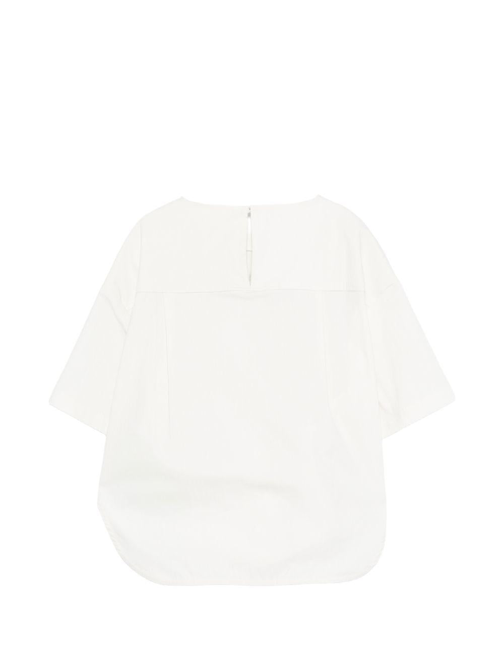 T-shirt per bambina Douuod Kids bianca con taschino sul petto DY5B01 P0589 101 DOUUOD KIDS 