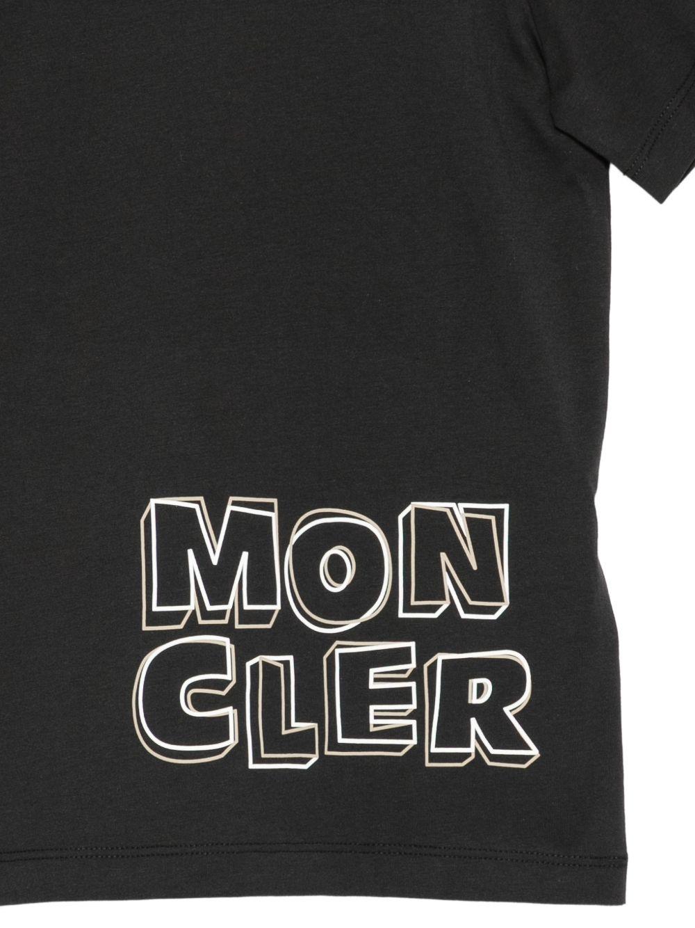 T-shirt per bambino Moncler Enfant nera con stampa logo L19548C0000689AFV 999 MONCLER KIDS 