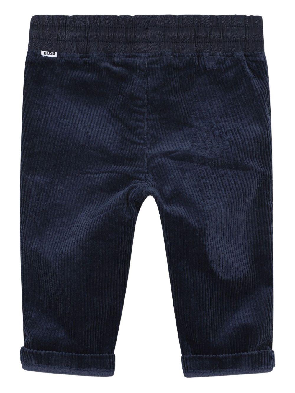 Pantaloni per neonato Boss Kidswear blu a coste con vita elasticizzata J52438 849 BOSS KIDS 